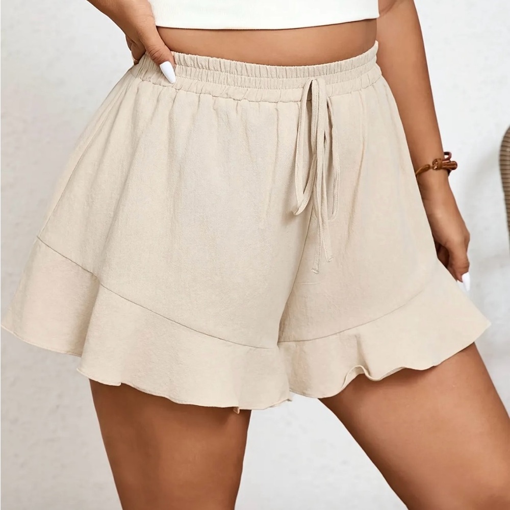 Women's Cream Ruffle Hem Shorts